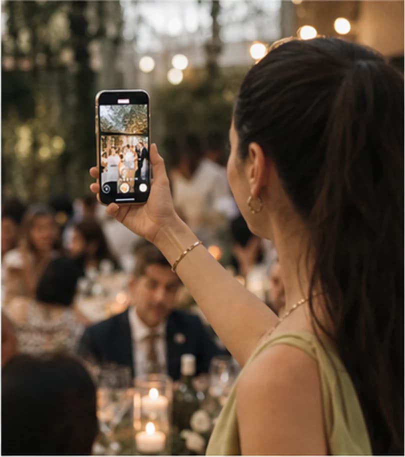 A frame from a short wedding video recorded on a guest's phone